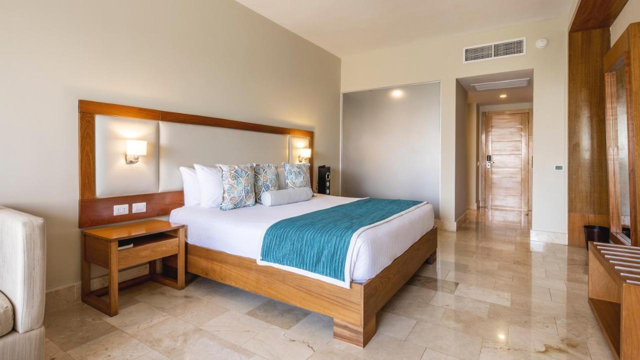Be Live Collection Canoa Bayahibe Exteriér fotografie A bedroom at the Iberostar Grand Hotel Bávaro